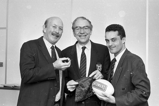 Rugby’s Junior Cup holders were handed a Smithwicks Towns Cup semi-final date with Ballyclare at the end of February 1992. The other tie saw Carrickfergus take on Banbridge. Both games were to be played on March 7, 1992. Pictured making the draw are Les Fryer, brand manager of Smithwicks, Jack Lewis, Ulster Branch competition secretary, and Jim Stevenson, vice president of the branch. Picture: News Letter archives
