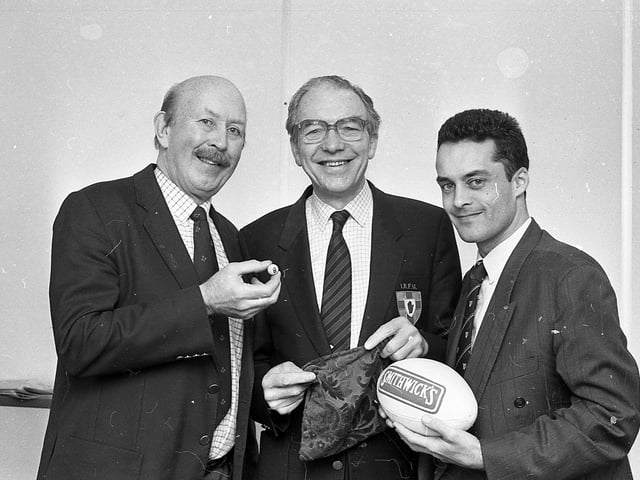 Rugby’s Junior Cup holders were handed a Smithwicks Towns Cup semi-final date with Ballyclare at the end of February 1992. The other tie saw Carrickfergus take on Banbridge. Both games were to be played on March 7, 1992. Pictured making the draw are Les Fryer, brand manager of Smithwicks, Jack Lewis, Ulster Branch competition secretary, and Jim Stevenson, vice president of the branch. Picture: News Letter archives