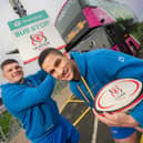 L-R: Ulster Rugby players Dave Ewers and Cormac Izuchukwu promoting Translink match day services.