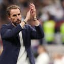 England manager Gareth Southgate applauds fans after the 2-1 defeat against France in the FIFA World Cup Qatar 2022 quarter final match at Al Bayt Stadium on Saturday in Al Khor, Qatar. (Photo by Richard Heathcote/Getty Images)
