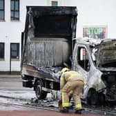 A burnt out lorry at Creggan shops after the annual 1916 Easter Rising parade. Picture: Kelvin Boyes/Press Eye
