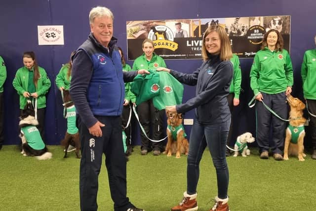Pictured is the Northern Ireland Crufts team with Lisburn man Michael McCartney, chairman of the Kennel Club Obedience Liaison Council for the UK and team manager and Elsa Izaguirre from Holistic Pets, the main sponsor