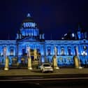 Belfast City Hall illuminated in blue to mark the 75th anniversary of the NHS in 2023. Photo: PA