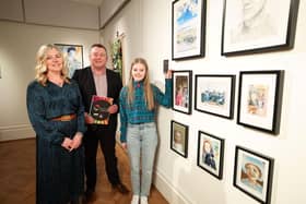 CCEA’s Art and Design Education Manager, Anne McGinn congratulates young artist Leah Massey on their artwork, along with Principal Gary Greer (from Bloomfield Collegiate School) at the exhibition launch