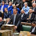 Jeremy Hunt's budget was cautious amid difficult choices, but Stormont's response was almost juevnile. Neither the DUP nor UUP lingered on the revelation that the protocol prevented Mr Hunt from exempting more businesses from VAT. Pic: UK Parliament/Maria Unger/PA Wire