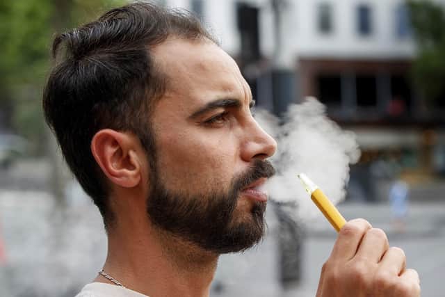 New Zealand on Tuesday passed into law a unique plan to phase out tobacco smoking by imposing a lifetime ban on young people buying cigarettes. (AP Photo/David Rowland, File)
