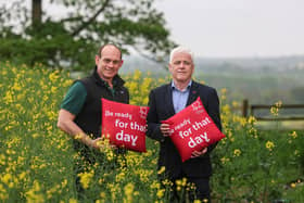 Former Ulster and Ireland rugby star and Co Armagh arable farmer Simon Best is teaming up with the British Heart Foundation NI at the Balmoral Show to encourage his fellow farmers to be aware of their heart health. Pictured with Simon at his farm in Poyntzpass, Newry is Fearghal McKinney, head of BHF NI. Picture: Submitted