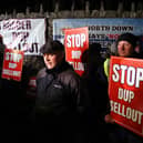 Mel Lucas, from Traditional Unionist Voice, speaks to the media as he joins protesters outside Larchfield Estate where the DUP held a private party meeting. The protesters are calling for the DUP not to go back into Stormont until the Irish Sea Border is removed. Picture date: Monday January 29, 2024. Liam McBurney/PA Wire