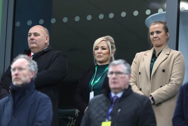 (left to right) IFA President Conrad Kirkwood, First Minister Michell O'Neill and Sinn Fein MLA Aisling Reilly stand for the anthems before the UEFA Women's Nations League Promotion/Relegation Play Off 2nd leg match at Windsor Park, Belfast Picture date: Tuesday February 27, 2024. PA Photo. See PA story ULSTER Windsor. Photo credit should read: Liam McBurney/PA Wire