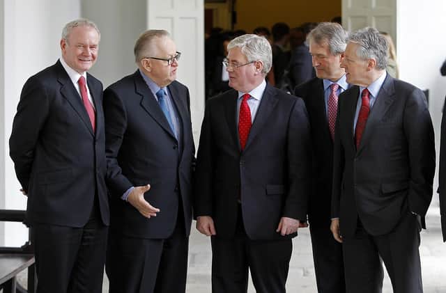 Martti Ahtisaari , second left along with Martin McGuinness, Eamon Gilmore, Owen Patterson, and Peter Robinson (L-R) at a conference on peace-building using Northern Ireland as a case study Picture: Julien Behal/PA Wire