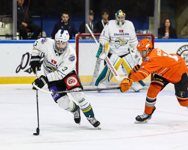 Belfast Giants’ Charlie Curti (left) with Sheffield Steelers’ Josh Nicholls during the EIHL Playoff Final on Sunday in Nottingham. (Photo by William Cherry/PressEye)