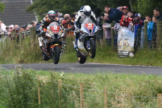 Conor Cummins (11, Conrod Racing BMW) and Dominic Herbertson (KTS Racing BMW) battle for second place in the Open race at Armoy.
