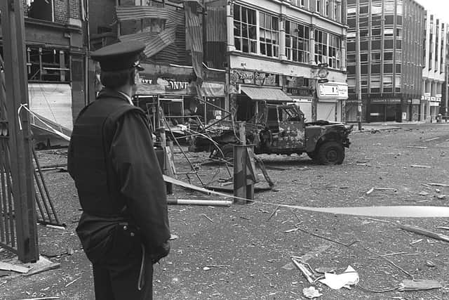The aftermath of a Belfast city centre IRA bomb attack in 1988 that claimed the lives of two UDR soldiers