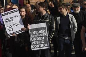 People take part during an Enough is Enough rally at Belfast City Hall to protest against rising energy bills and the cost of living crisis. Picture date: Saturday October 1, 2022.