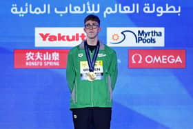 Magheralin’s Daniel Wiffen with his second gold medal of the World Aquatics Championships in Qatar following men’s 1500m freestyle final glory for Team Ireland. (Photo by Quinn Rooney/Getty Images)