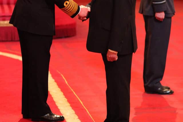 Norman McBurney is made an OBE by the Prince of Wales, 2014