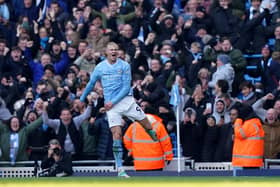 Manchester City's Erling Haaland celebrates scoring the opening goal during the Premier League match against Liverpool at the Etihad Stadium. (Photo by Martin Rickett/PA Wire)