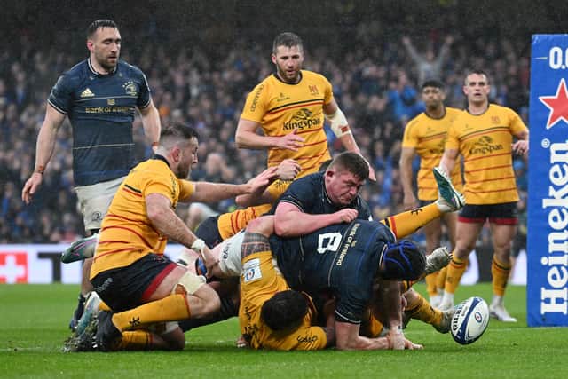 Ryan Baird of Leinster breaks away to score the team's first try during the Heineken Champions Cup clash against Ulster at Aviva Stadium in Dublin on Saturday.