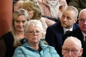 Máiría Cahill (left) and Jamie Bryson(centre back) pictured at the Shankill Bombing 30th Anniversary Memorial Service at West Kirk Presbyterian Church in Belfast on Monday 23 October 2023. 
Photo: Picture by Jonathan Porter/PressEye