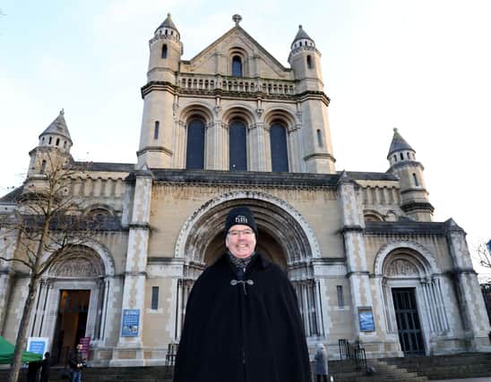 Black Santa, Dean Stephen Forde started today outside Belfast's St. Anne's Cathedral. The Dean will be there until Christmas Eve and all donations collected will be shared among a number of local charities.