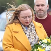 Donna and Hugh Harper, the parents of 14-year-old Leona Harper who died in the explosion, arrive at a commemoration and remembrance service in Creeslough, Co Donegal on the first anniversary of the explosion at a service station which killed 10 people.