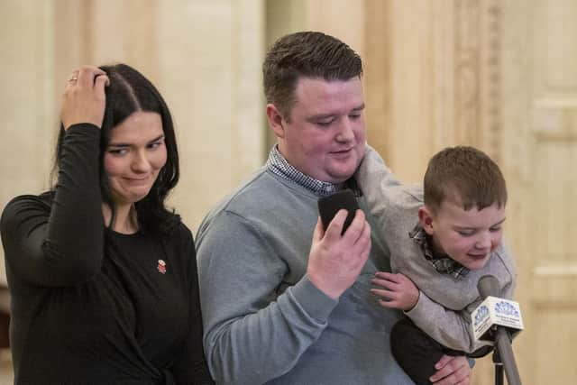 Daithi MacGabhann and his parents Mairtin  MacGabhann and Seph Ni Mheallain at Parliament Buildings at Stormont, after a recall failed to nominate a Speaker of the Northern Ireland Assembly