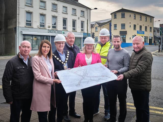 Chair of Mid Ulster District Council, Councillor Dominic Molloy is pictured with Jenny Martin, NI Area Team Lead, DLUHC; Paul McFlynn, CivCo Ltd; Conall McKee, DfI Roads Service and Carntogher DEA Councillors Brian McGuigan, Paddy Kelly, Córa Corry and Sean McPeake. Credit: Submitted