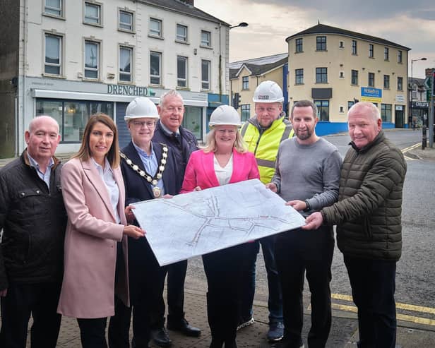 Chair of Mid Ulster District Council, Councillor Dominic Molloy is pictured with Jenny Martin, NI Area Team Lead, DLUHC; Paul McFlynn, CivCo Ltd; Conall McKee, DfI Roads Service and Carntogher DEA Councillors Brian McGuigan, Paddy Kelly, Córa Corry and Sean McPeake. Credit: Submitted