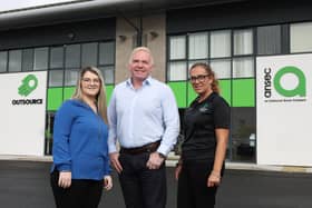 Terry Moore, CEO of Outsource Group, announces the new jobs with team members Orla McDonald, sales support and Gena Notman, IT support engineer