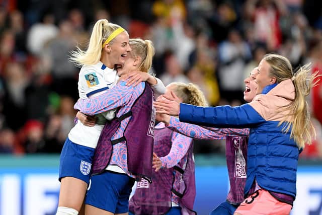 Chloe Kelly of England celebrates with her team mates after scoring her team's fifth and winning penalty in the penalty shoot out against Nigeria. Photo by Bradley Kanaris/Getty Images