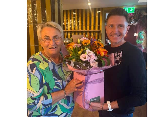 Northern Trust Healthcare Assistant Eleanor Coulter, who is celebrating an extraordinary career milestone after five decades in the health service, pictured with Philip Dawson, Manager at the Roddens Residential Home in Ballymoney.