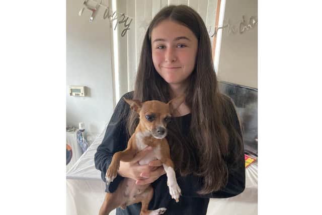 Undated family handout photo of 13-year-old Chelsea Gray from Belfast who has been reunited with the her dog Coco which was stolen more than a year ago. Issue date: Thursday September 8, 2022.