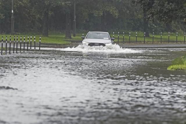 A car driving through floodwater in Cork. Weather warnings will come into force as the UK and Ireland brace for the arrival of Storm Agnes, which will bring damaging winds and big stormy seas. Agnes, the first named storm of the season, will affect western regions of the UK and Ireland, with the most powerful winds expected on the Irish Sea coasts.