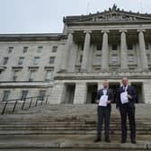 Loyalist activist Jamie Bryson (left) and TUV leader Jim Allister at Stormont holding legal advice that says there is still an Irish Sea border as the assembly returns. But London has moved away from a neutral approach to Northern Ireland, accelerated by ​Ireland’s hypocritical legacy legal action against the UK. Photo: Brian Lawless/PA Wire