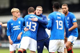 Rangers' interim manager Steven Davis (centre) celebrates with players after the final whistle in the cinch Premiership win over St Mirren at SMISA Stadium, Paisley.