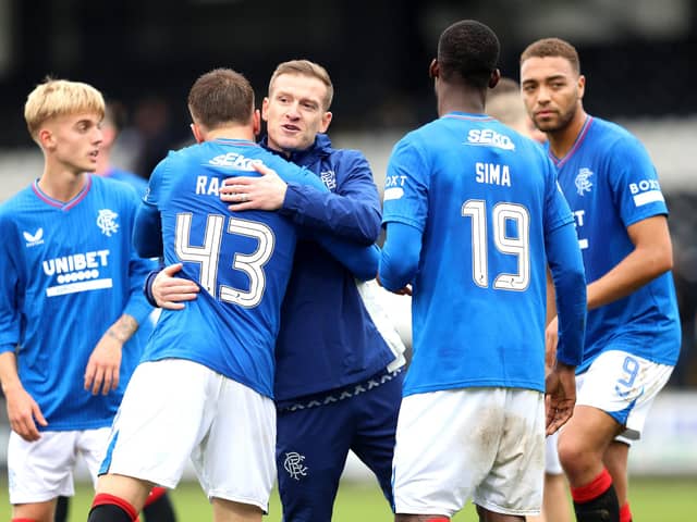 Rangers' interim manager Steven Davis (centre) celebrates with players after the final whistle in the cinch Premiership win over St Mirren at SMISA Stadium, Paisley.