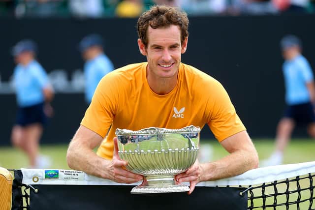 Andy Murray celebrates with the trophy after victory in the Rothesay Open Nottingham final against Arthur Cazaux