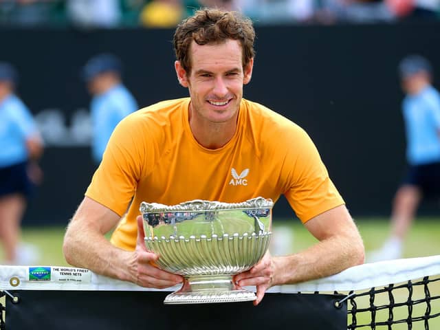 Andy Murray celebrates with the trophy after victory in the Rothesay Open Nottingham final against Arthur Cazaux