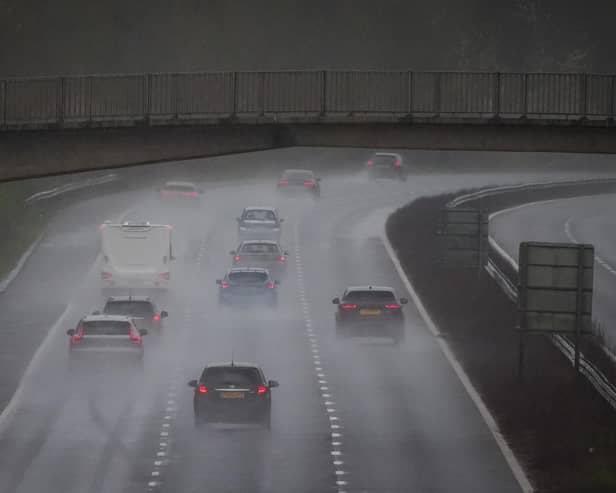 The weather suggest possible spray and flooding on roads probably making journey times longer
