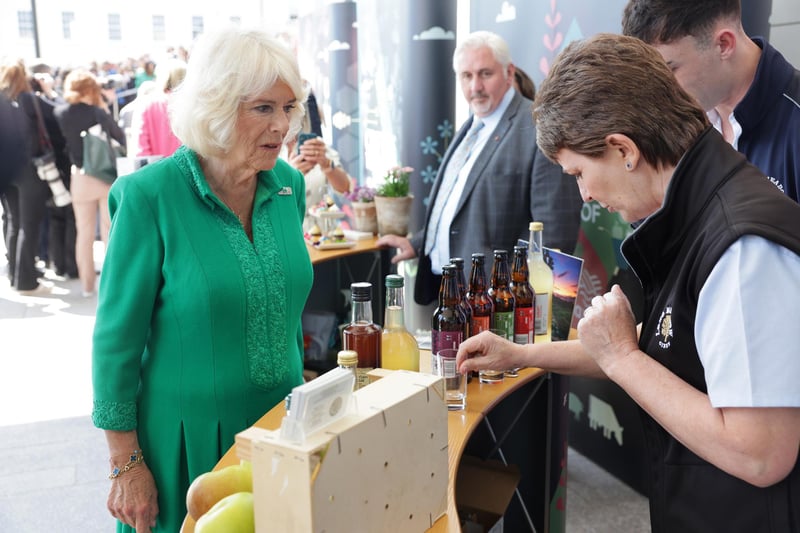 Queen Camilla samples local produce during a Celebration of Culture at Market Theatre Square in Armagh