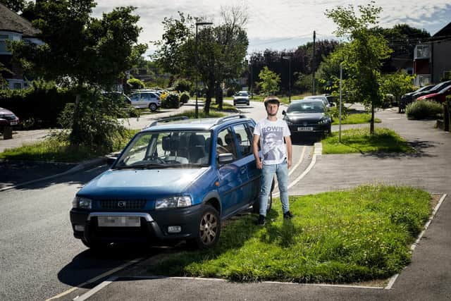 Nicholas Stone, a 24 year-old student at Arts University Bournemouth with his family's 1998 Mazda Demio at their home in Epsom, Surrey which they are having to sell due to the upcoming ULEZ expansion. Mr Stone, who notes that the car is older than he is, said his parents bought the car new