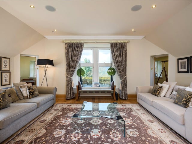 The sumptious living area with spectacular views over the countryside.