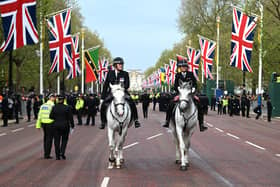Mounted police officers on The Mall ahead of the coronation of King Charles III and Queen Camilla on Saturday.   Photo: Charles McQuillan/PA Wire