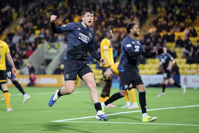 Rangers' Mikey Moore celebrates after scoring his side's second goal during the William Hill Premiership match at The Home of the Set Fare Arena, Livingston. (Photo by Steve Welsh/PA Wire)