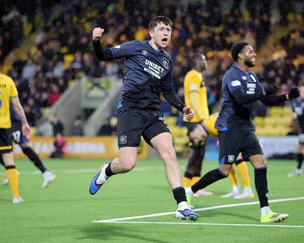 Rangers' Mikey Moore celebrates after scoring his side's second goal during the William Hill Premiership match at The Home of the Set Fare Arena, Livingston. (Photo by Steve Welsh/PA Wire)