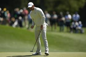 Rory McIlroy celebrates after a putt on the third hole during second round at the Masters golf tournament at Augusta