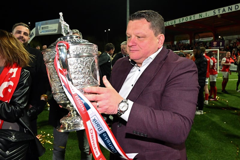Larne owner Kenny Bruce with the Premiership title