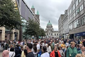 Members of the public watch performers at Fleadh Cheoil na hÉireann 2026, in Belfast.
