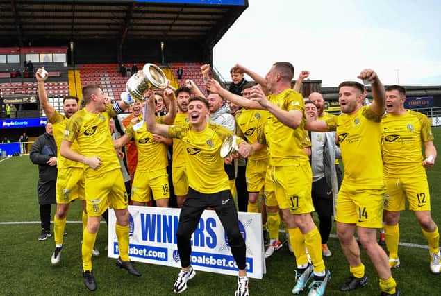 Comber Rec celebrate winning the Steel & Sons Cup final on Christmas morning at Seaview in Belfast against Crumlin Star after extra-time. (Photo by Andrew McCarroll/Pacemaker Press)