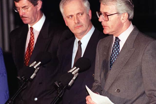 Prime Minister John Major (right) and his Irish counterpart John Bruton (centre). John Major was concerned loyalists would walk away from the ceasefire in 1996 if they thought the British government was giving into Sinn Fein demands.